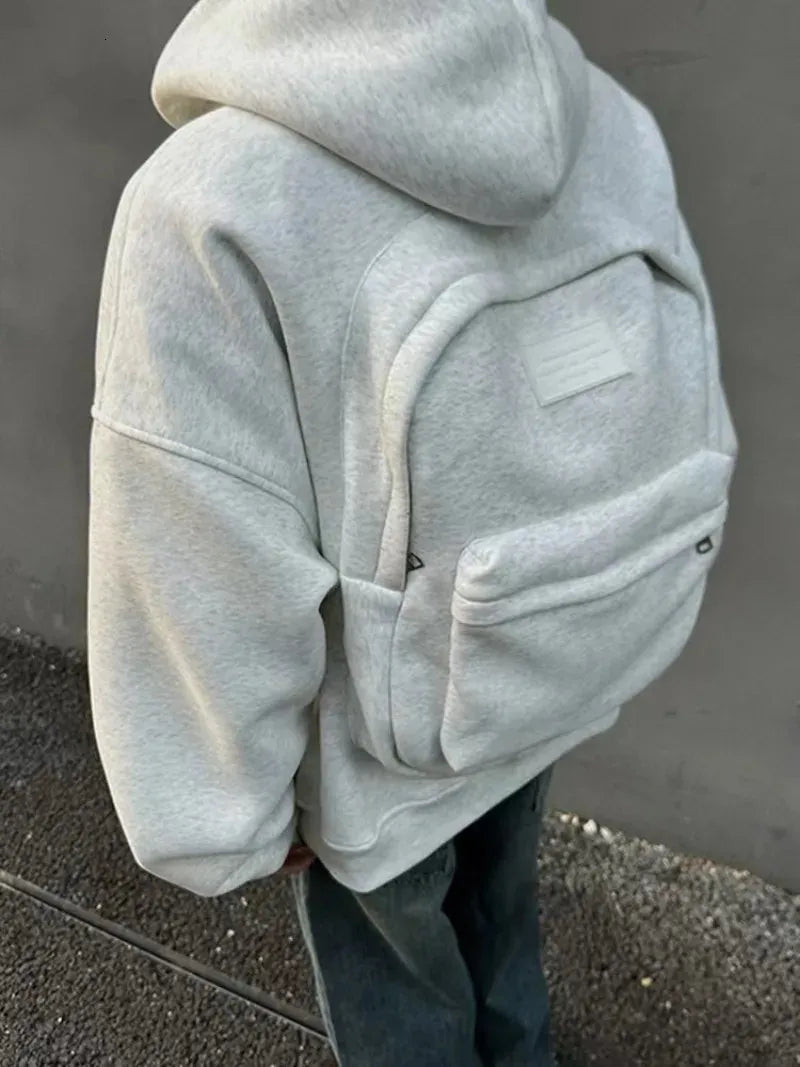 FlySmart Hoodie – Kelioninis džemperis su paslėpta kuprine